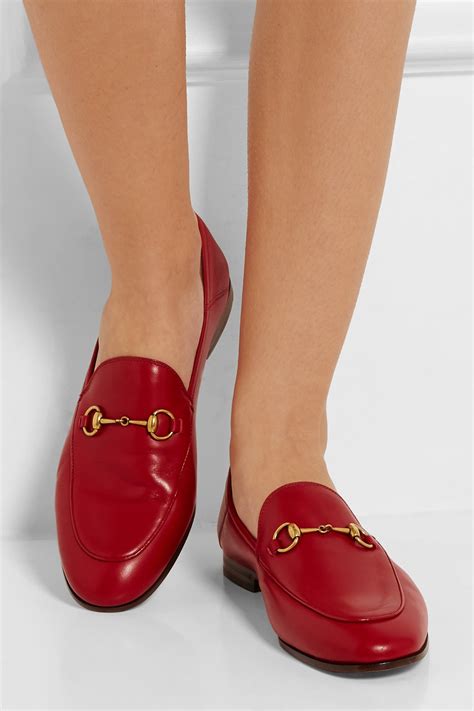 gucci red logo loafers|Gucci loafers with red stripe.